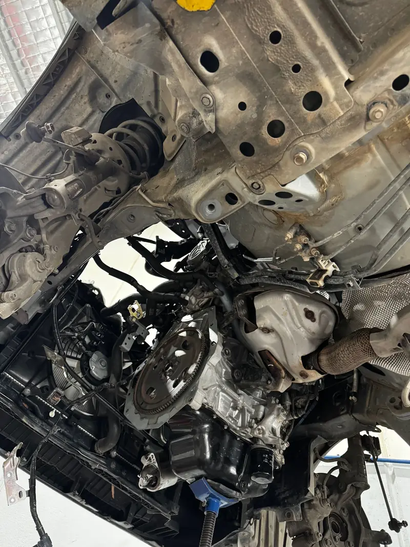 Engine bay stripped down for mechanical repairs
