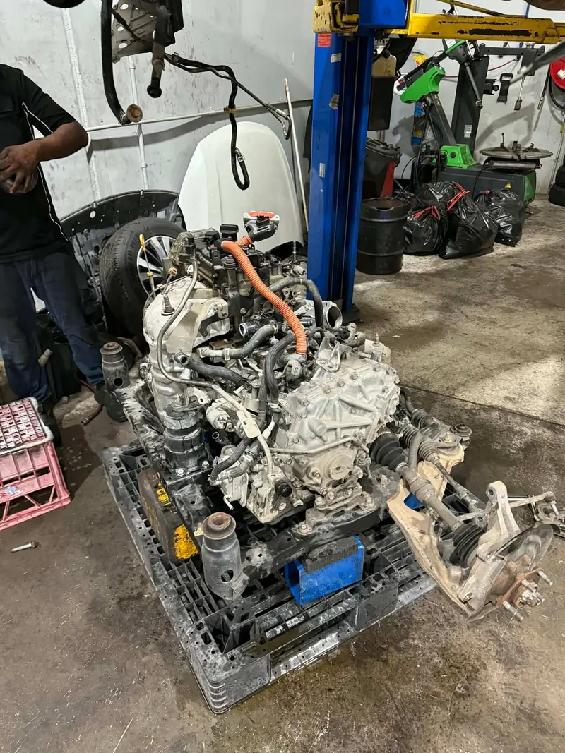 Engine and transmission removed for repair
